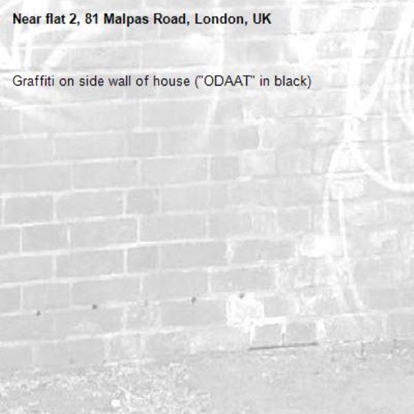 Graffiti on side wall of house ("ODAAT" in black)-flat 2, 81 Malpas Road, London, UK