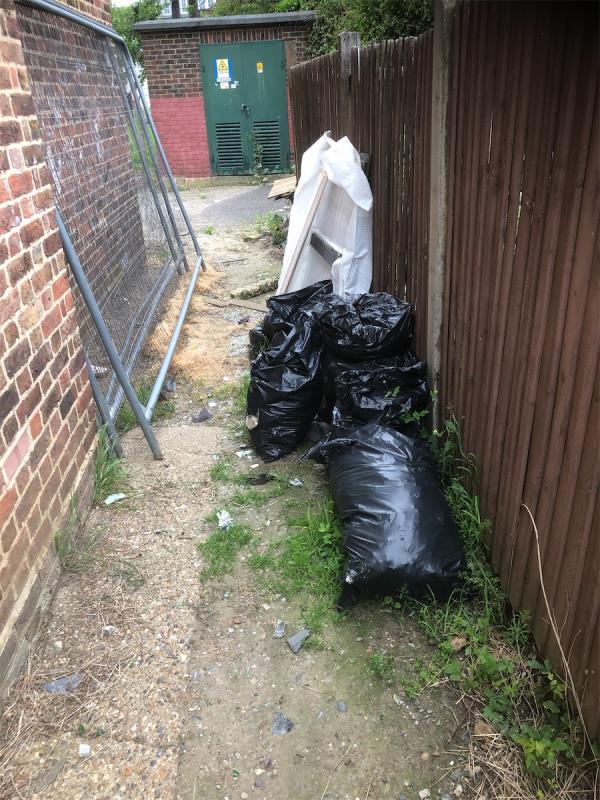 137-147. Please clear flytip of bags etc from side of block-137 Battersby Road, London, SE6 1SB
