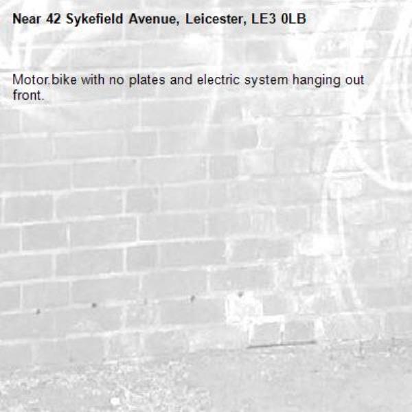 Motor.bike with no plates and electric system hanging out front.-42 Sykefield Avenue, Leicester, LE3 0LB