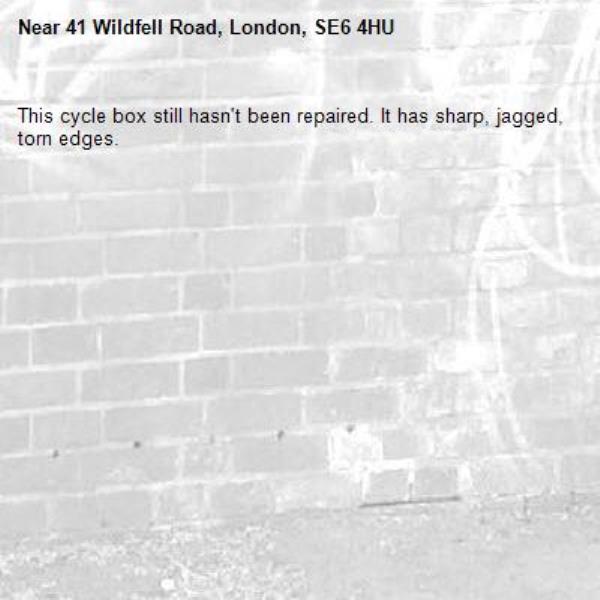 This cycle box still hasn't been repaired. It has sharp, jagged, torn edges.-41 Wildfell Road, London, SE6 4HU