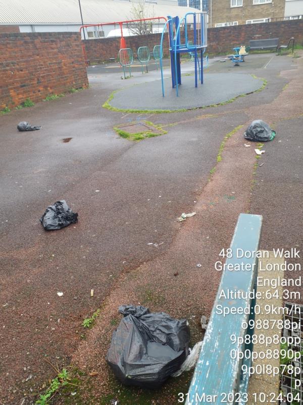 Play area, Dennison Point,  has not been cleared of bin bags, glass, gas bottles , bottles cans and debris since last reported. Site's looking increasingly neglected. -Gibbins Road, Stratford, London