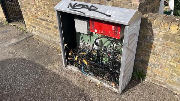 Electrical unit exposed to open air / the public. Likely to cause issues / serious harm when it rains or if children put their hands in it. -59 Florence Road, Hornsey, London, N4 4DJ