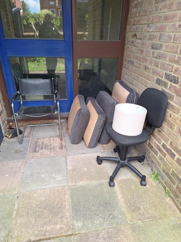 Perth court. Flytipped chair and cushions next to the old bin cupboard -Basement Flat, 14 The Avenue, Eastbourne, BN21 3YA