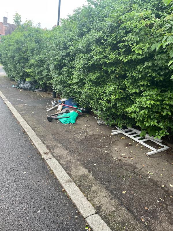 Lots of rubbish dumped again. Visible to public. -45 Lamerock Road, Bromley, BR1 5LY