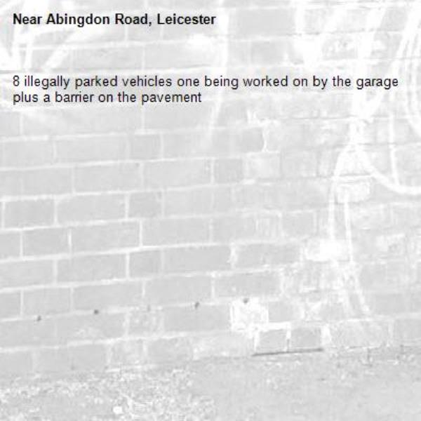 8 illegally parked vehicles one being worked on by the garage plus a barrier on the pavement -Abingdon Road, Leicester