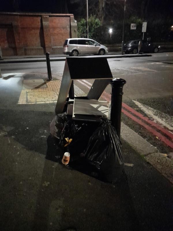 Bags and furniture dumped on footpath corner-530 Oxford Road, Reading, RG30 1EG