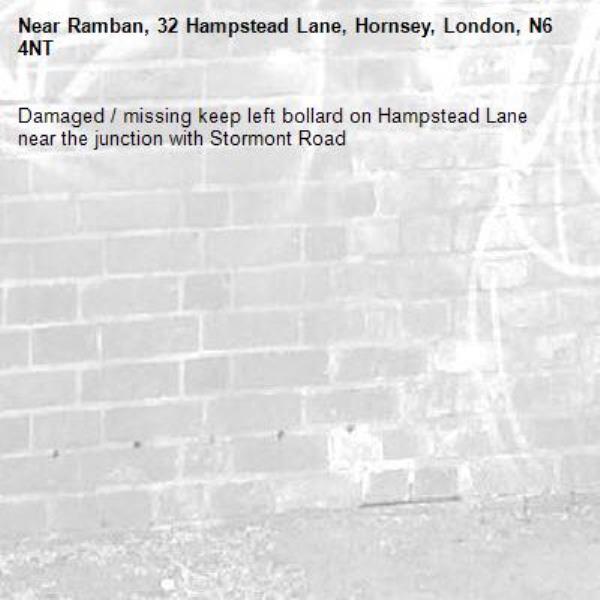 Damaged / missing keep left bollard on Hampstead Lane near the junction with Stormont Road -Ramban, 32 Hampstead Lane, Hornsey, London, N6 4NT