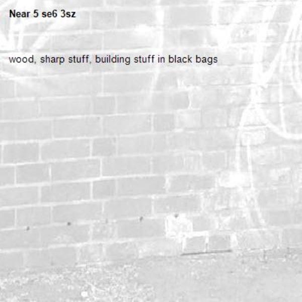 wood, sharp stuff, building stuff in black bags-5 se6 3sz