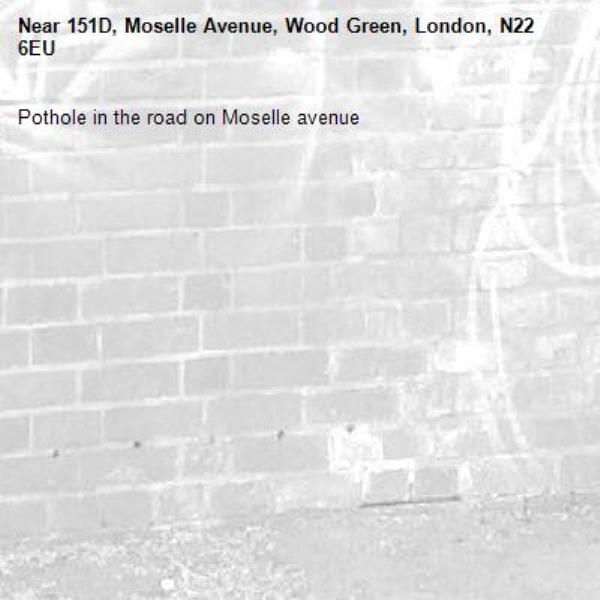 Pothole in the road on Moselle avenue -151D, Moselle Avenue, Wood Green, London, N22 6EU