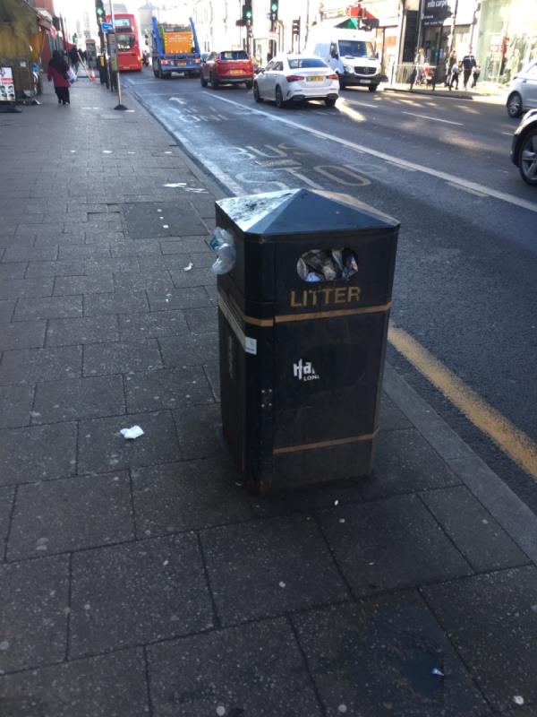 Litter bin full outside no. 550 High Rd N17-550 High Road, Tottenham, N17 9SY