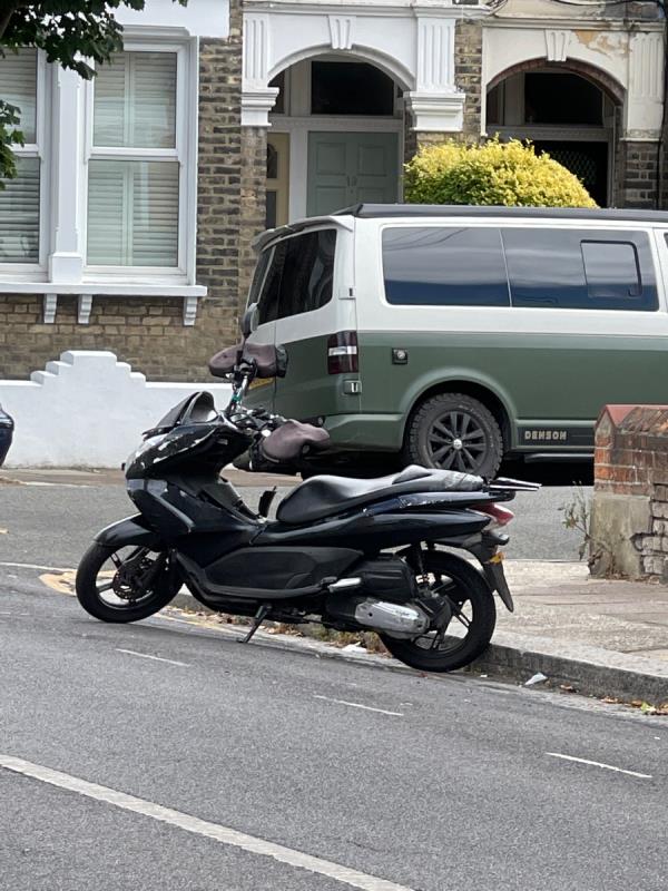 Abandoned scooter lying on ground for weeks. -2a Loubet Street, Tooting, SW17 9HD