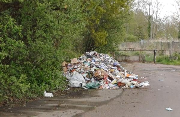 2-3 large piles of household type waste-1 Riverside Yard, Hawley Road, Blackwater, Farnborough, GU17 9EP