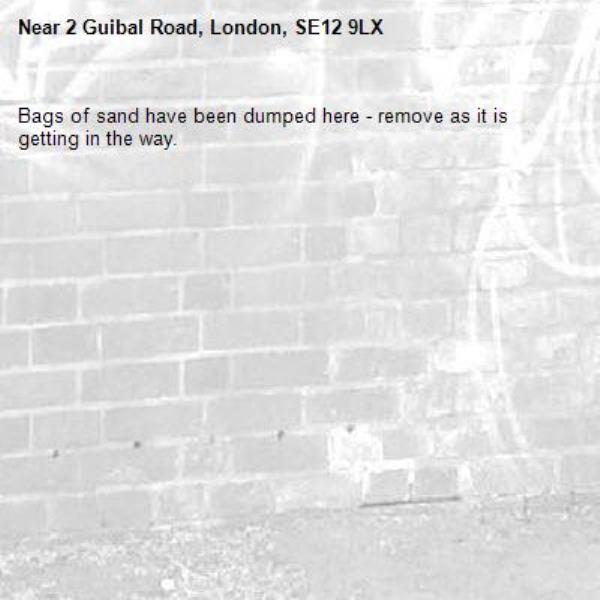 Bags of sand have been dumped here - remove as it is getting in the way.-2 Guibal Road, London, SE12 9LX