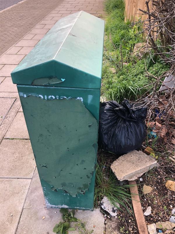 Please clear black bag from behind cable box-136 Downham Way, Bromley, BR1 5NT