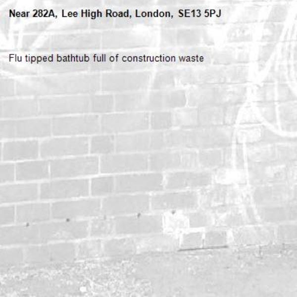 Flu tipped bathtub full of construction waste-282A, Lee High Road, London, SE13 5PJ