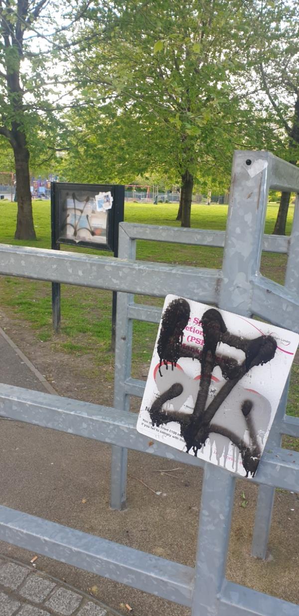 Graffiti on signs by the entrance to Canning Town Recreation Grounds. Same as on the board in Ashburton Woods reported over 6 months ago and not removed yet!-26 Sophia Road, Canning Town, London, E16 3PF