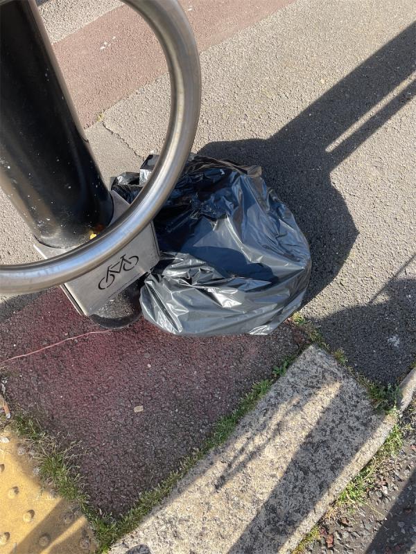 Black bin bag dumped opposite 72 Bradgate Road-74 Bradgate Road, London, SE6 4TR