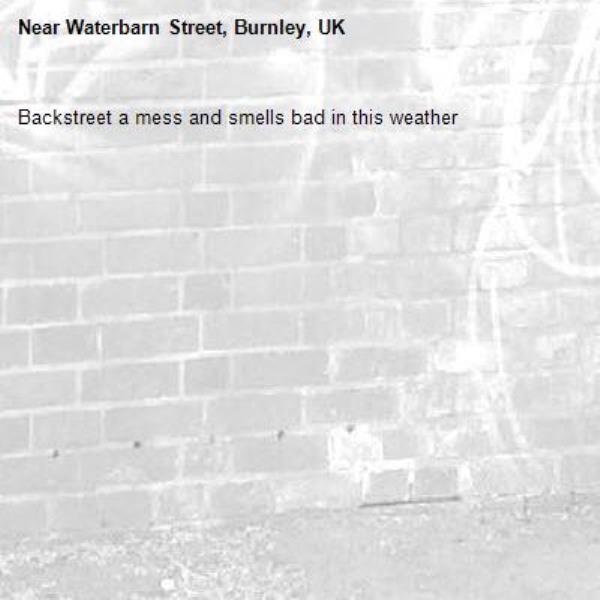 Backstreet a mess and smells bad in this weather-Waterbarn Street, Burnley, UK
