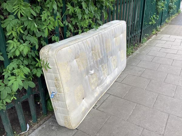 A mattress has been left up against our school gates . -141 Sangley Road, Catford, London, SE6 2DY