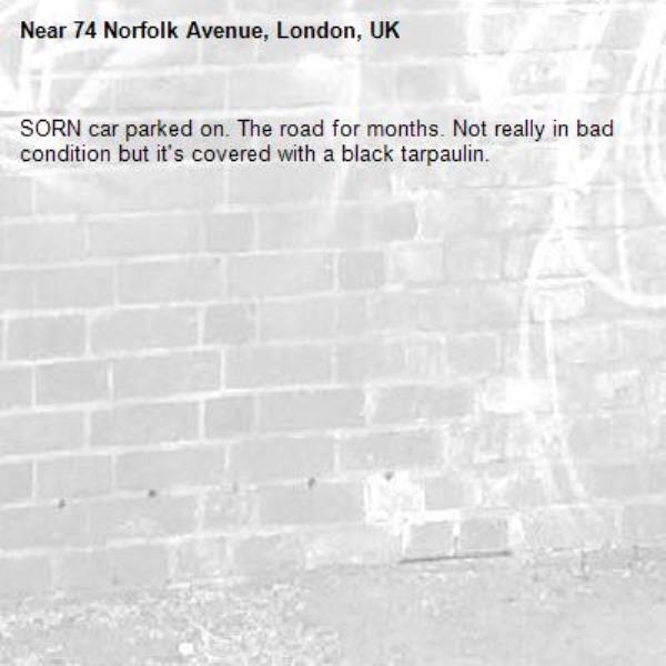 SORN car parked on. The road for months. Not really in bad condition but it&#39;s covered with a black tarpaulin.-74 Norfolk Avenue, London, UK