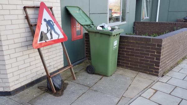 Bin left out with rubbish in for weeks.  Spreading over pavement.-70 Bell Green, London, SE26 4PZ