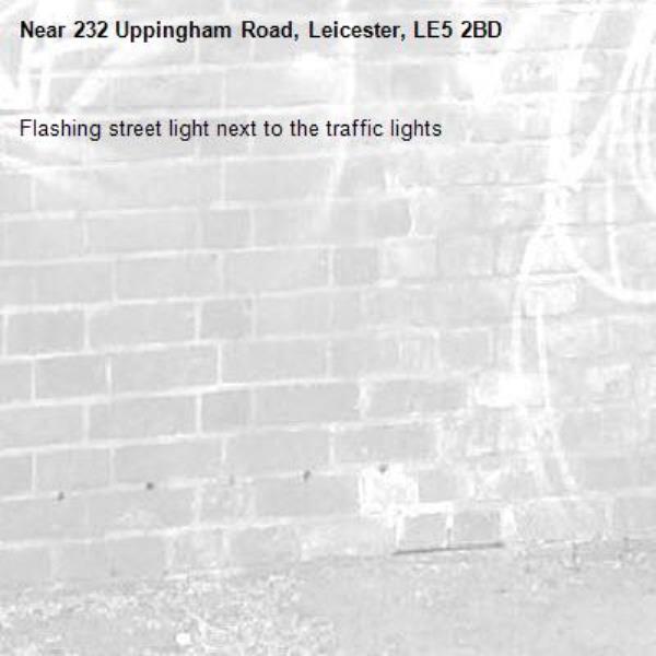Flashing street light next to the traffic lights-232 Uppingham Road, Leicester, LE5 2BD