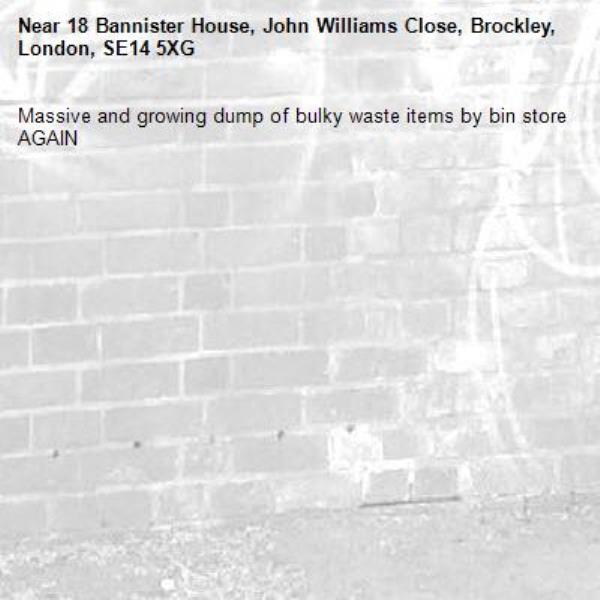 Massive and growing dump of bulky waste items by bin store AGAIN-18 Bannister House, John Williams Close, Brockley, London, SE14 5XG