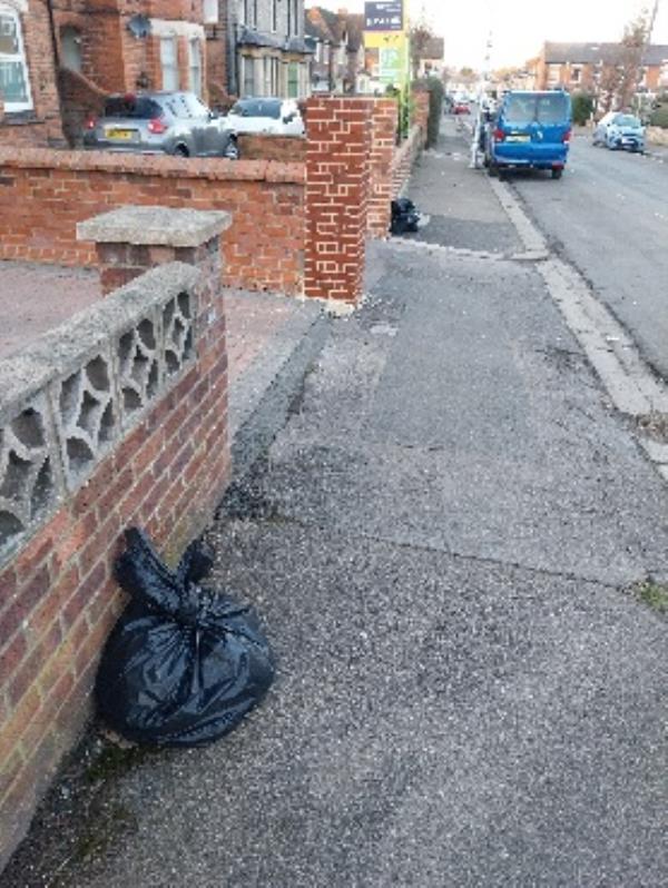 two rubbish bags on pavement -98 Connaught Road, RG30 2UF, England, United Kingdom