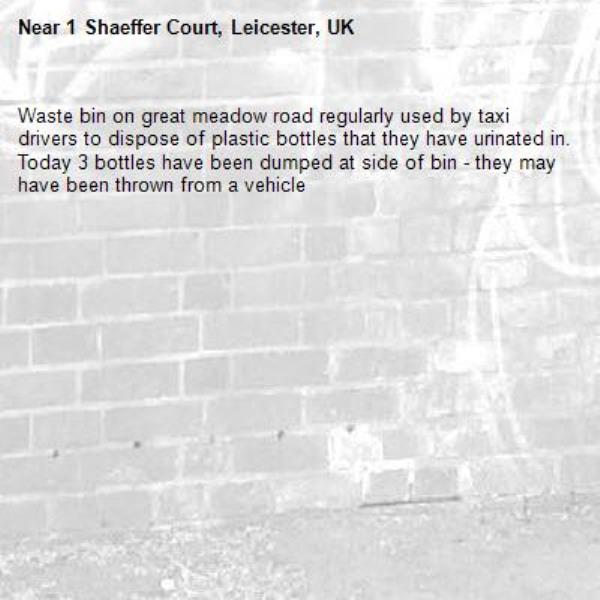 Waste bin on great meadow road regularly used by taxi drivers to dispose of plastic bottles that they have urinated in.  Today 3 bottles have been dumped at side of bin - they may have been thrown from a vehicle-1 Shaeffer Court, Leicester, UK