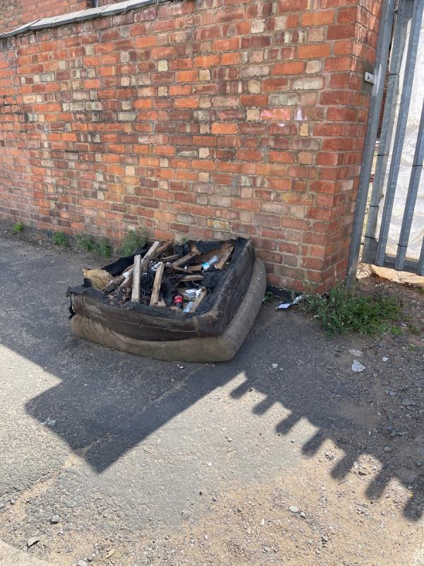 Abandon sofa left in middle of the pavement filled with other rubbish and rats-179 Prestwold Road, Leicester, LE5 0EZ