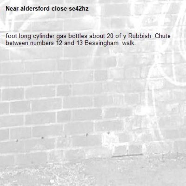 foot long cylinder gas bottles about 20 of y Rubbish  Chute between numbers 12 and 13 Bessingham  walk.-aldersford close se42hz