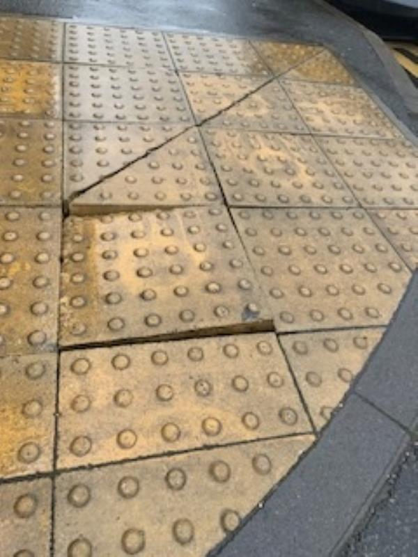 The blister paving is loose and presents as a trip hazard, especially for blind and vision impaired people-Archdeacon Lane