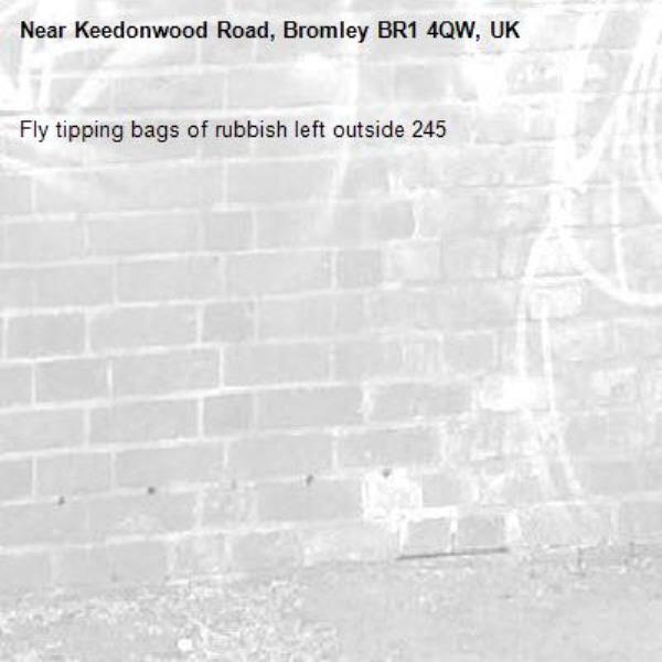 Fly tipping bags of rubbish left outside 245-Keedonwood Road, Bromley BR1 4QW, UK
