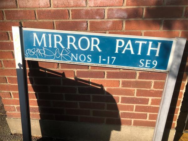Junction of Lambscroft Avenue. Remove graffiti from street sign-1 Mirror Path, Grove Park, London, SE9 4NY