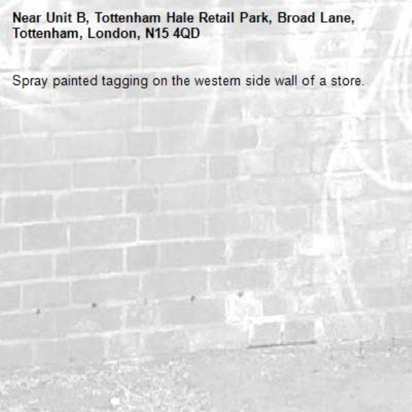 Spray painted tagging on the western side wall of a store.-Unit B, Tottenham Hale Retail Park, Broad Lane, Tottenham, London, N15 4QD