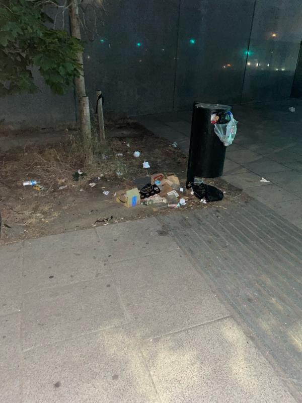 Overflowing litter bin. Litter on pavement. -Tull House, 1 Temple Mill Lane, London, E20 1LT