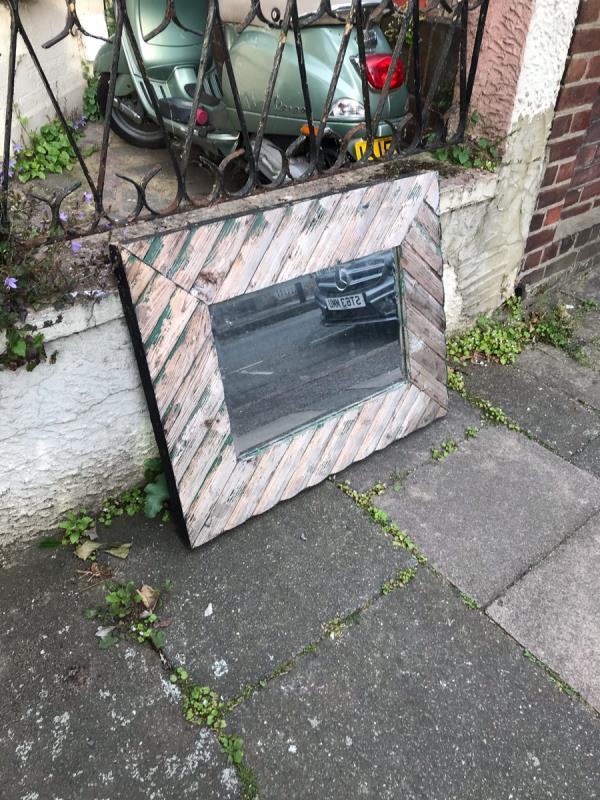 Mirror left in street -42 Gresham Road, London, E6 6DS
