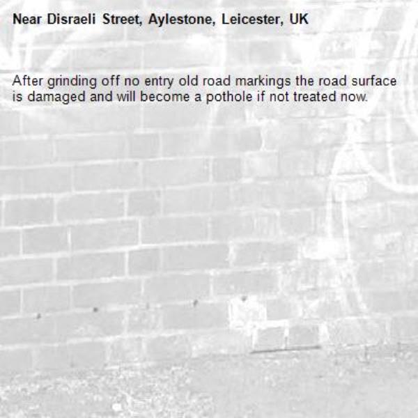 After grinding off no entry old road markings the road surface is damaged and will become a pothole if not treated now. -Disraeli Street, Aylestone, Leicester, UK