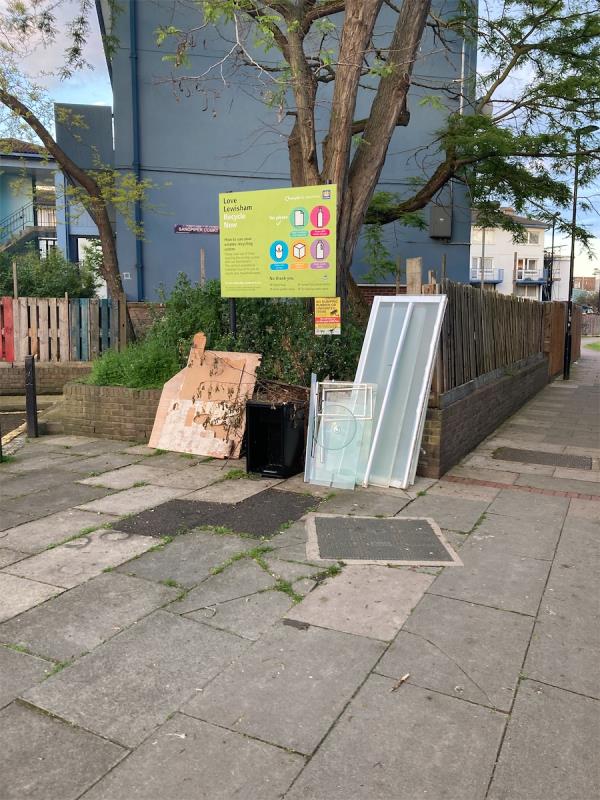 Fly tipping of glass furniture -Sandpiper Court, Edward Place, London, SE8 5PZ