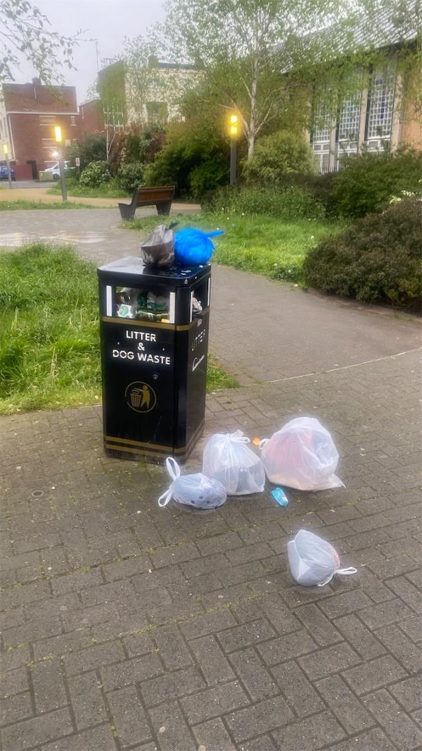 Several street bins overflowing with rubbish flying around the streets-47 Fife Road, Canning Town, London, E16 1XP