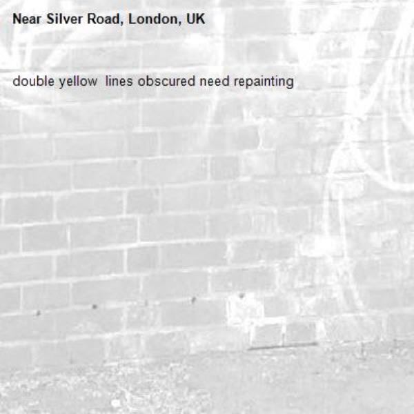 double yellow  lines obscured need repainting -Silver Road, London, UK