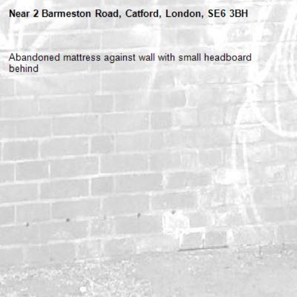Abandoned mattress against wall with small headboard behind-2 Barmeston Road, Catford, London, SE6 3BH