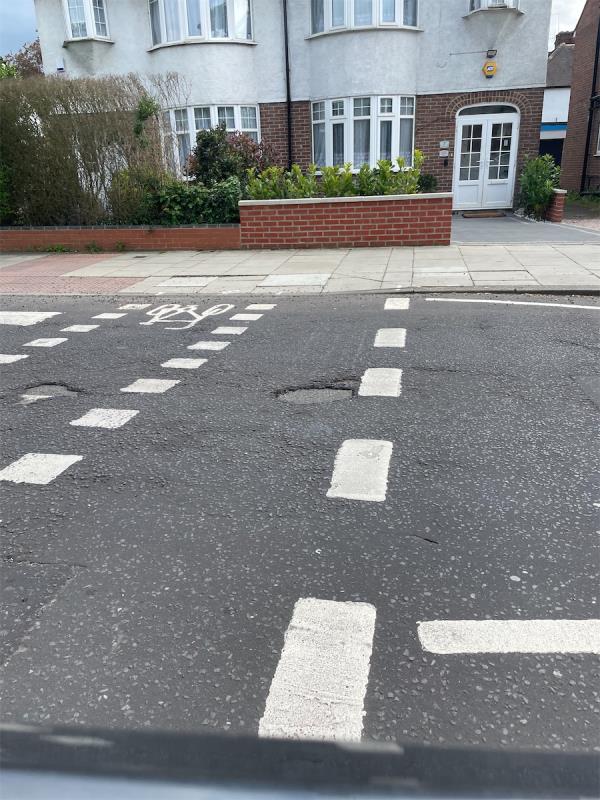 Potholes on zebra crossing -5 Ruislip Road East, West Ealing, W13 0AZ