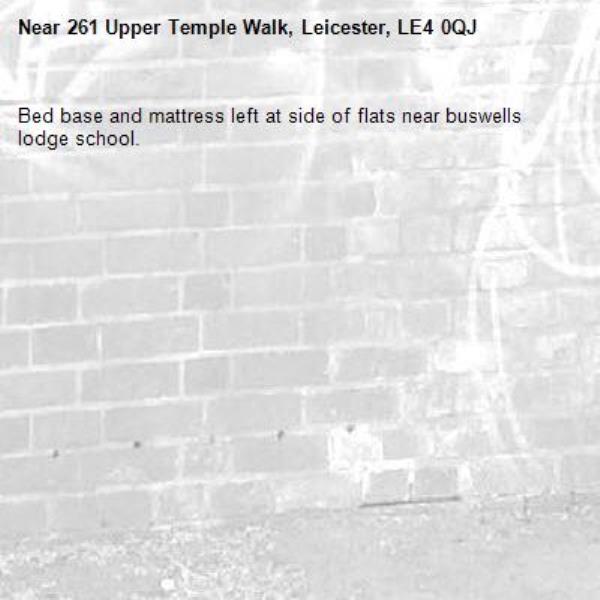 Bed base and mattress left at side of flats near buswells lodge school. -261 Upper Temple Walk, Leicester, LE4 0QJ