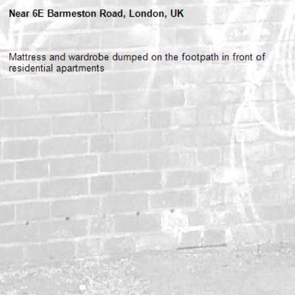Mattress and wardrobe dumped on the footpath in front of residential apartments-6E Barmeston Road, London, UK