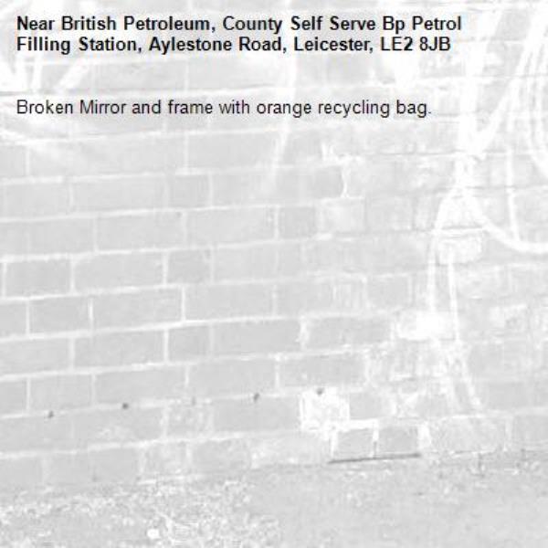 Broken Mirror and frame with orange recycling bag.-British Petroleum, County Self Serve Bp Petrol Filling Station, Aylestone Road, Leicester, LE2 8JB