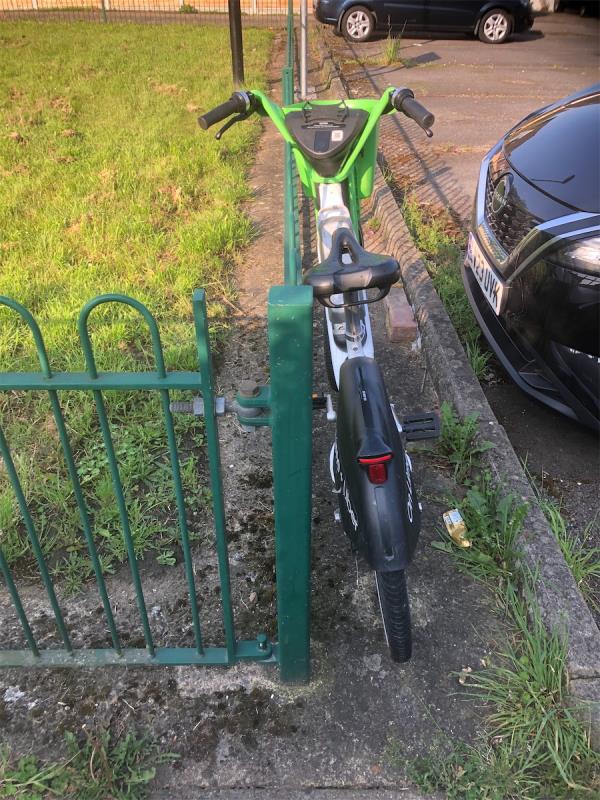 Please clear an abandoned Lime bike from in square-58 Randlesdown Road, Bellingham, London, SE6 3HB