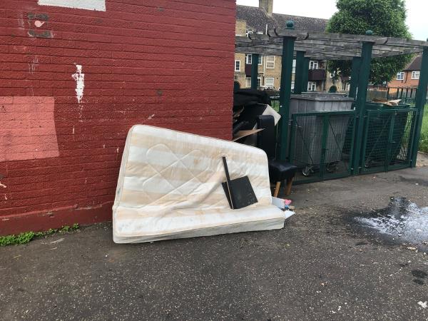 Rear of 34-44. Please clear flytipping including matress and other wooden items-44 Crutchley Road, London, SE6 1QL