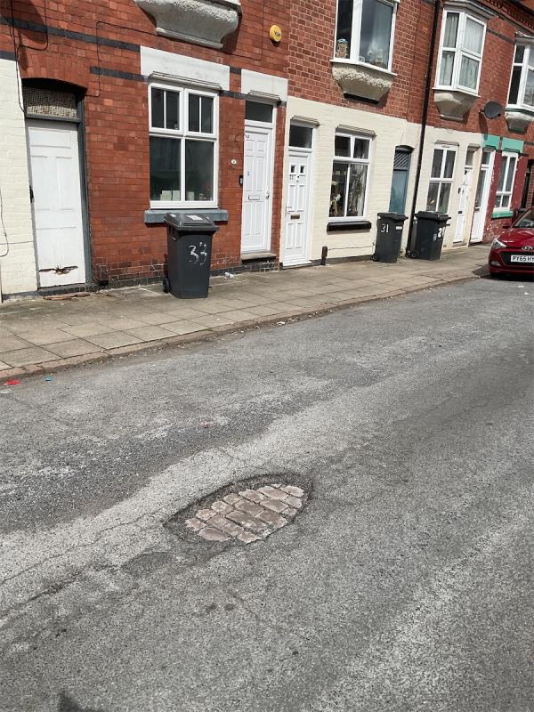 Huge pothole opposite number35 I reporting this second time. Nothing has been done after my first report-45 Dunster Street, Leicester, LE3 0SE