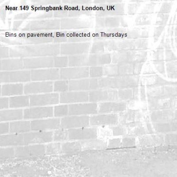 Bins on pavement, Bin collected on Thursdays-149 Springbank Road, London, UK